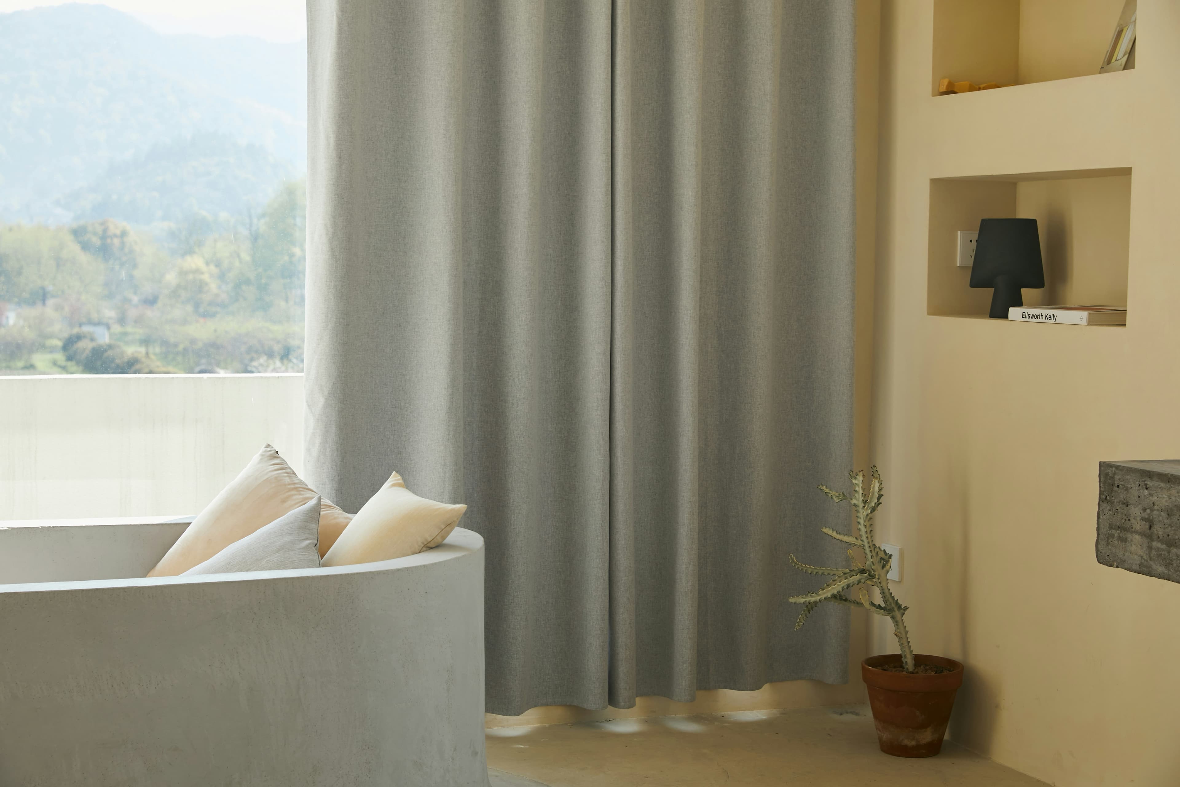 Soft indoor window furnishings adding warmth to a living space