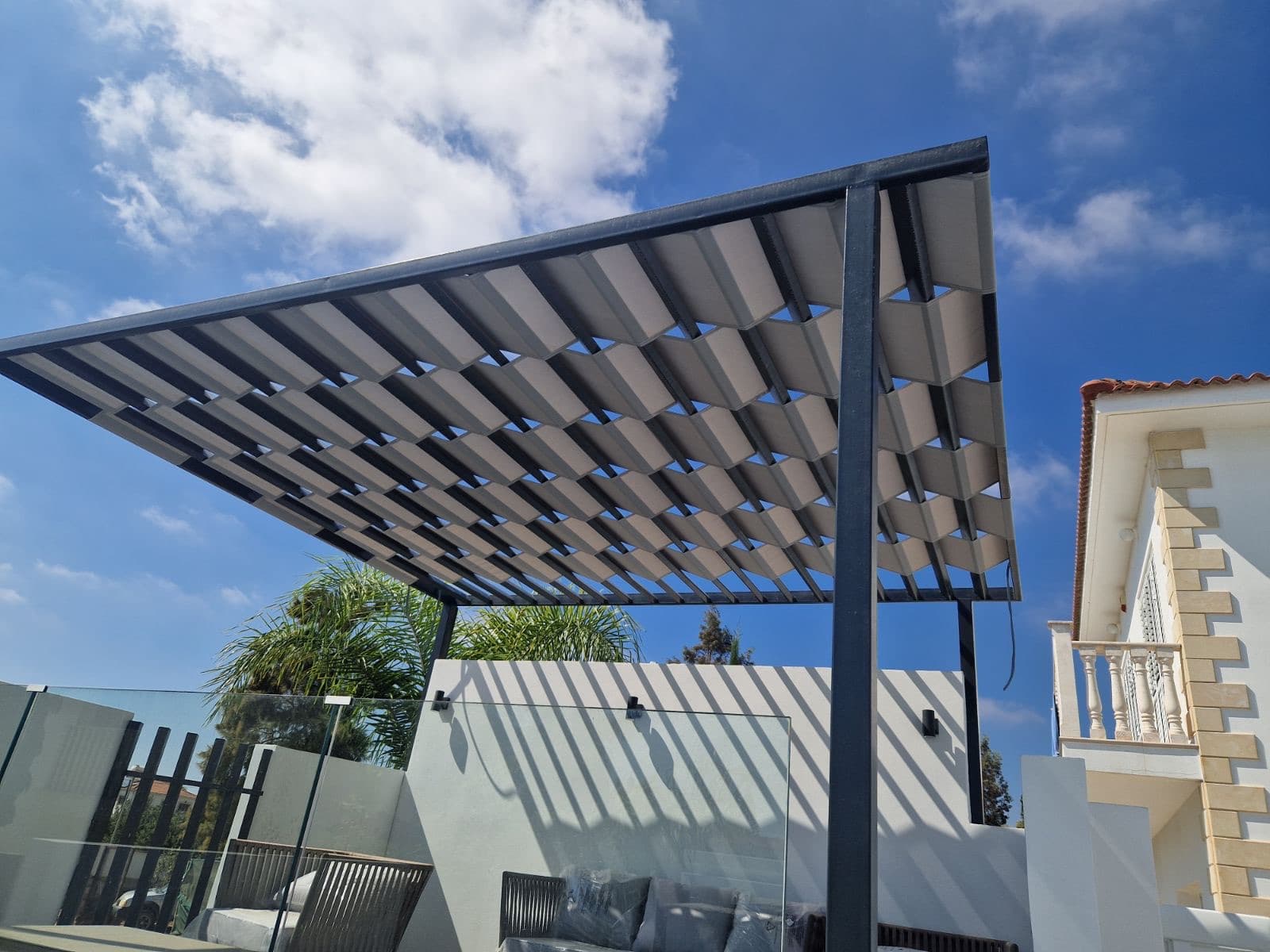 Modern pergola providing shade in an outdoor living area